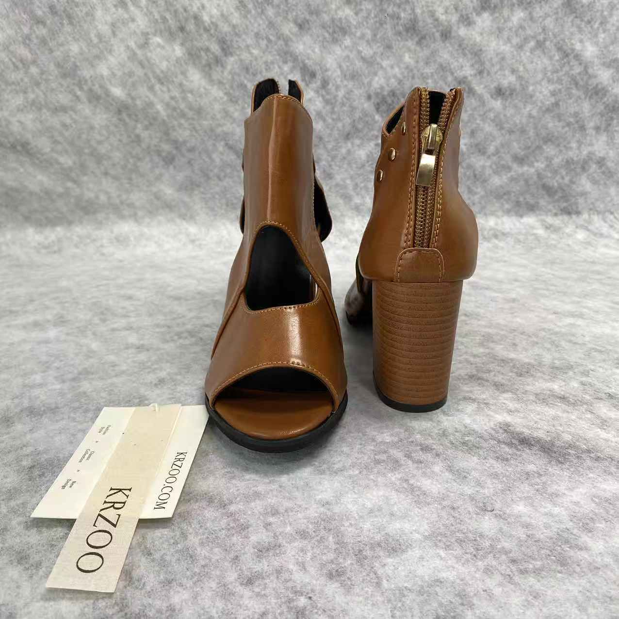 Fish-shaped hollowed-out thick heel high heels