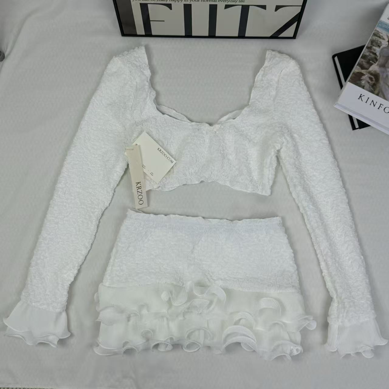Blouse with wooden earflaps and half-skirt set