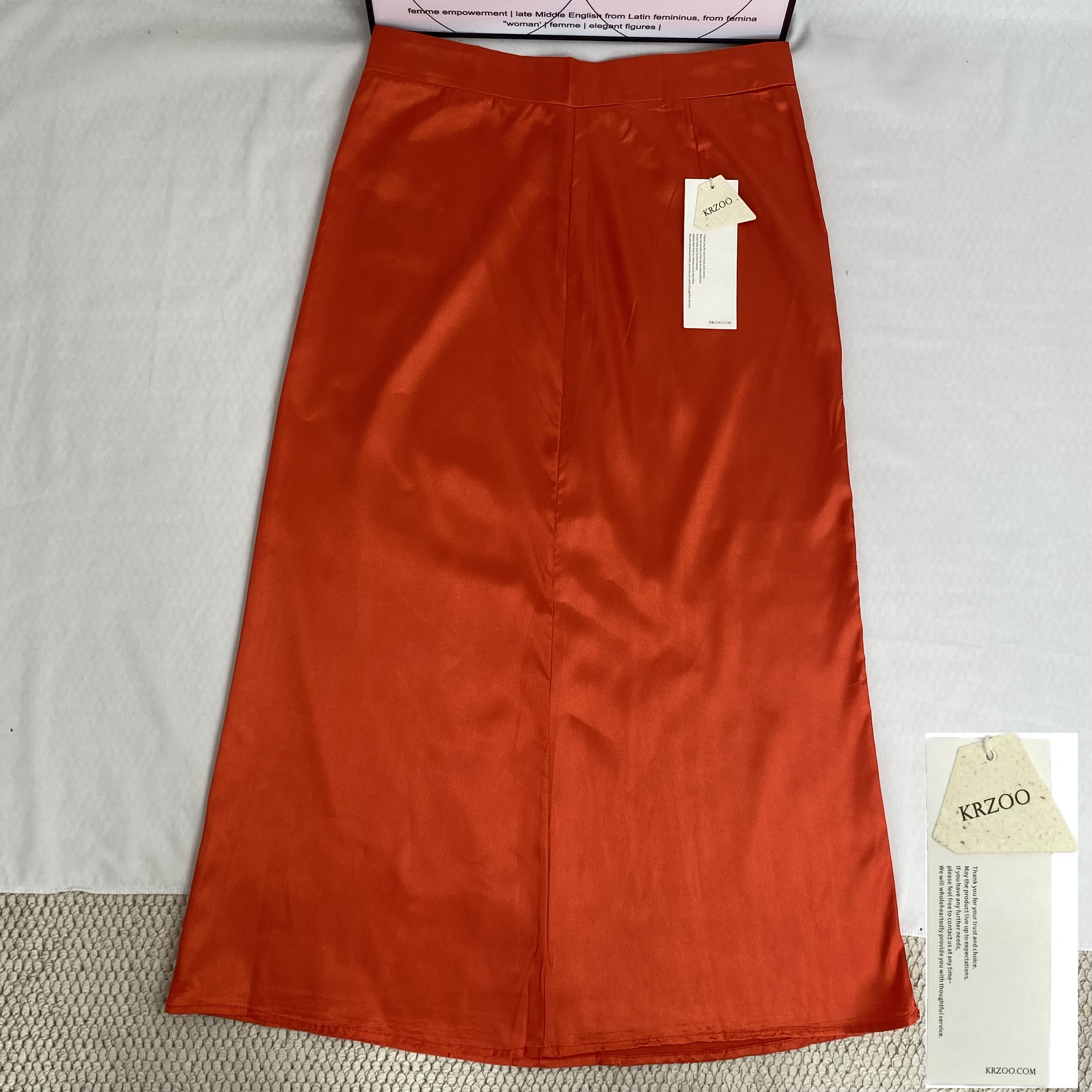 Half-length red A-line skirt