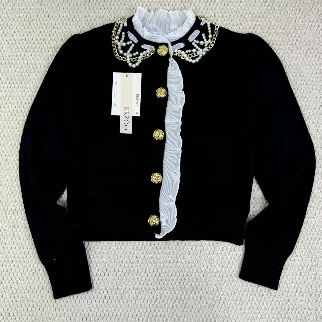 Short-sleeved blazer with ruffled edges