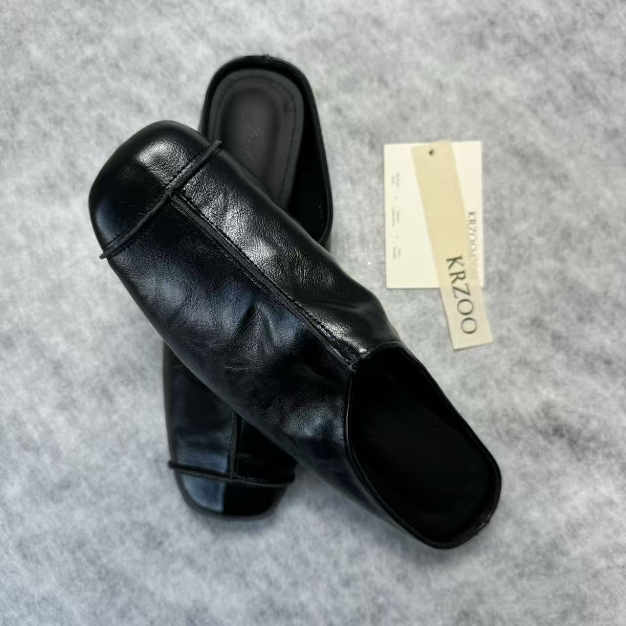 Leather-covered headless half-heeled slippers