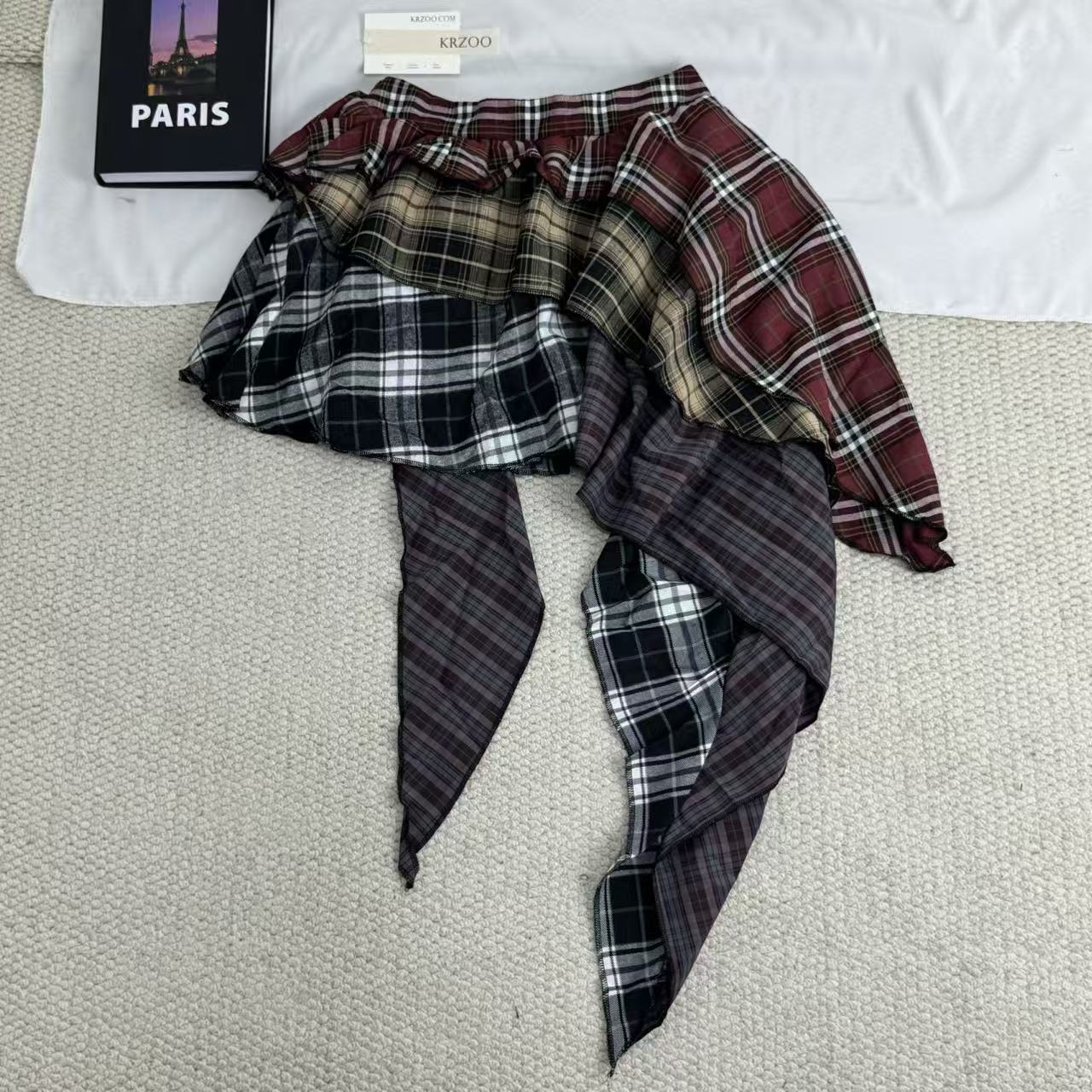 Irregular color-matched plaid half-length skirt