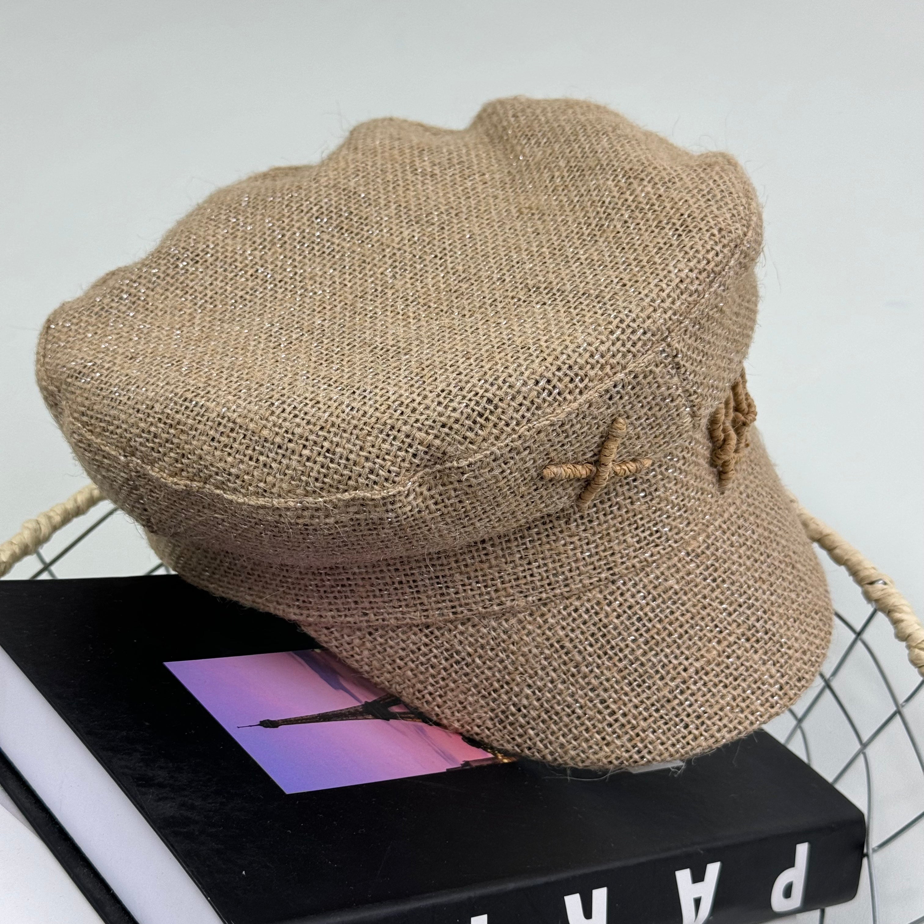 Woven straw cap with a flat top