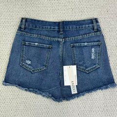Hole-rimmed fringed denim shorts