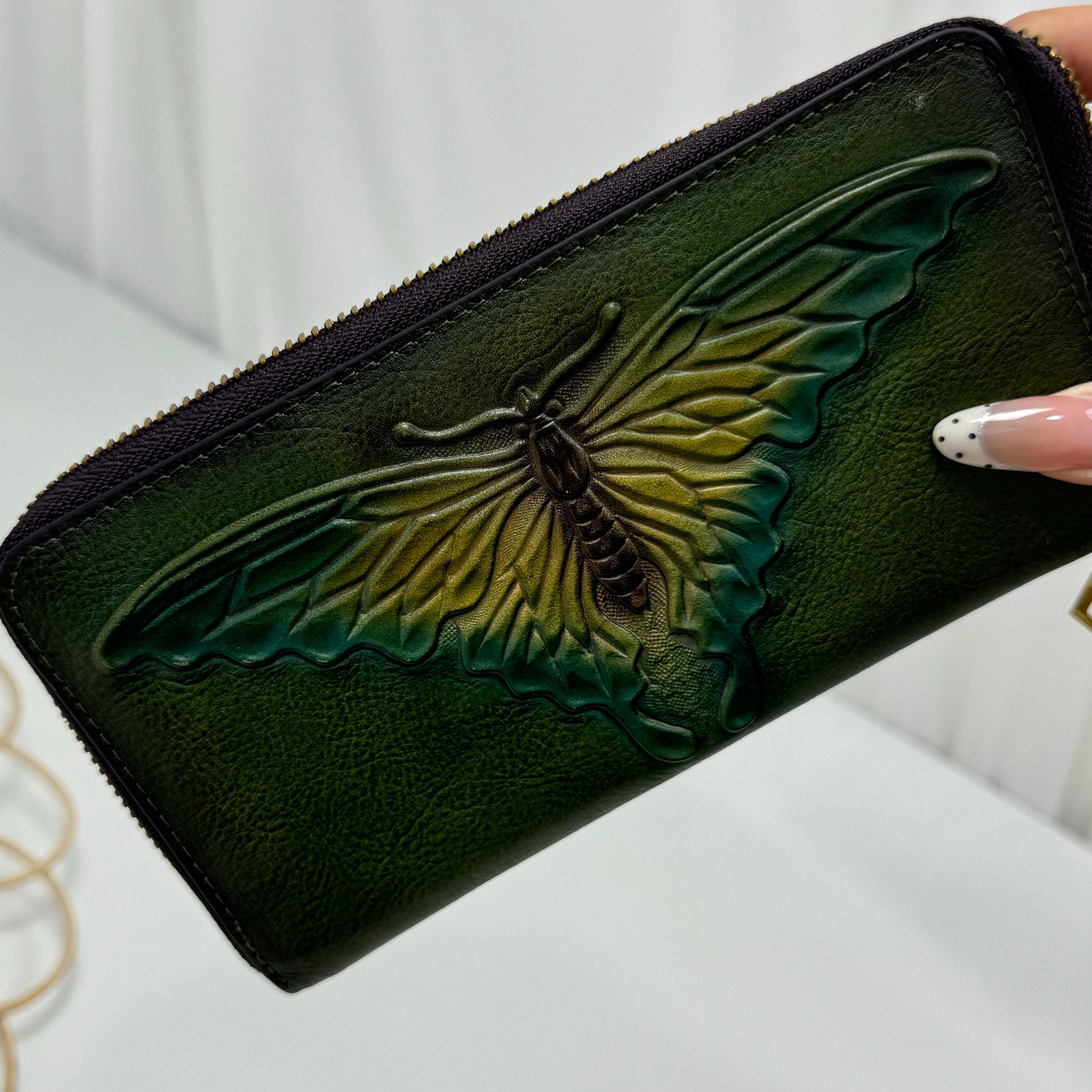 Butterfly embossed leather wallet
