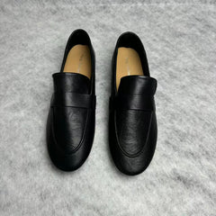 One step in a leather-soled small shoe
