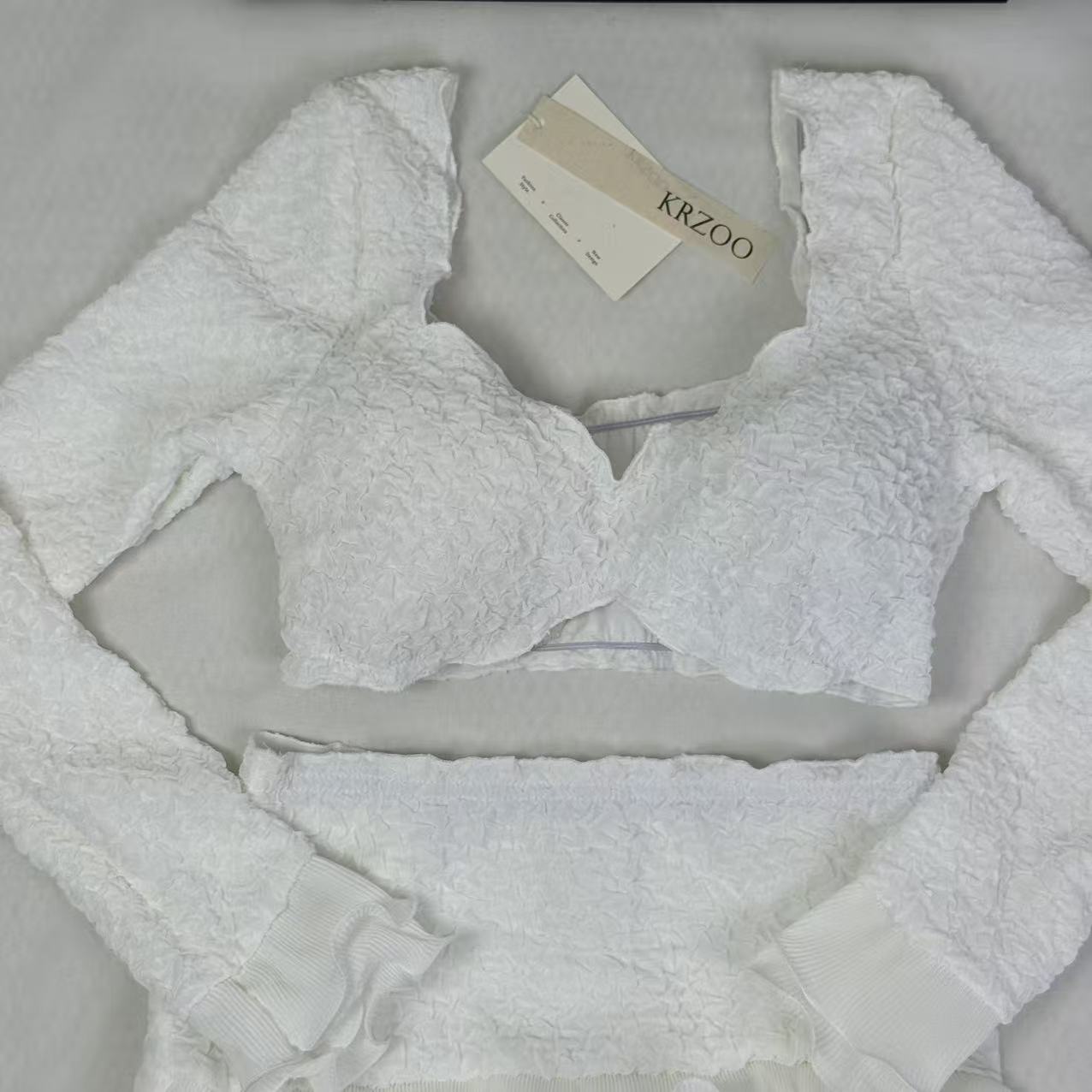 Blouse with wooden earflaps and half-skirt set