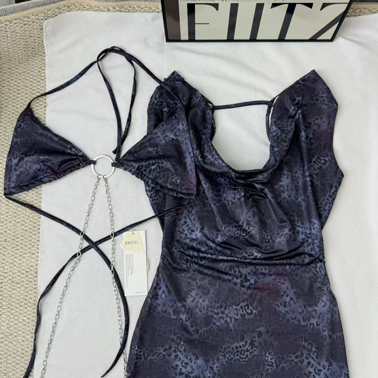 Necklace-style open-front dress