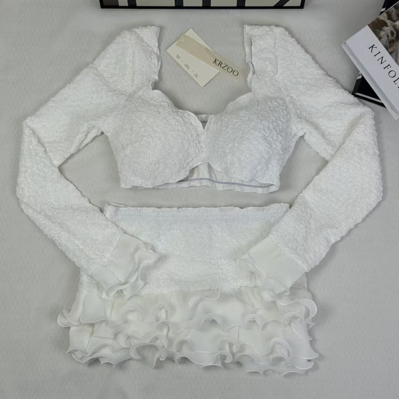 Blouse with wooden earflaps and half-skirt set