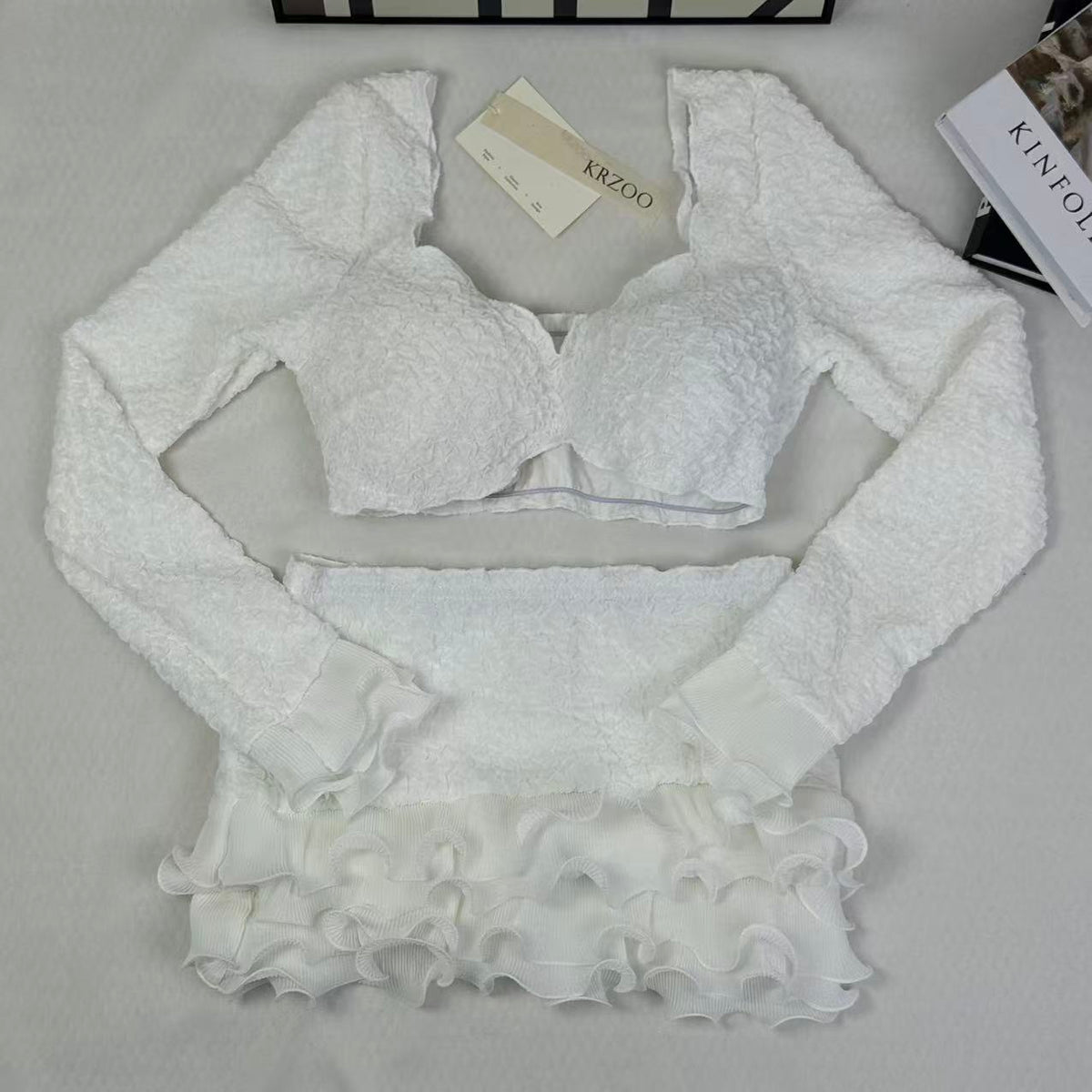 Blouse with wooden earflaps and half-skirt set