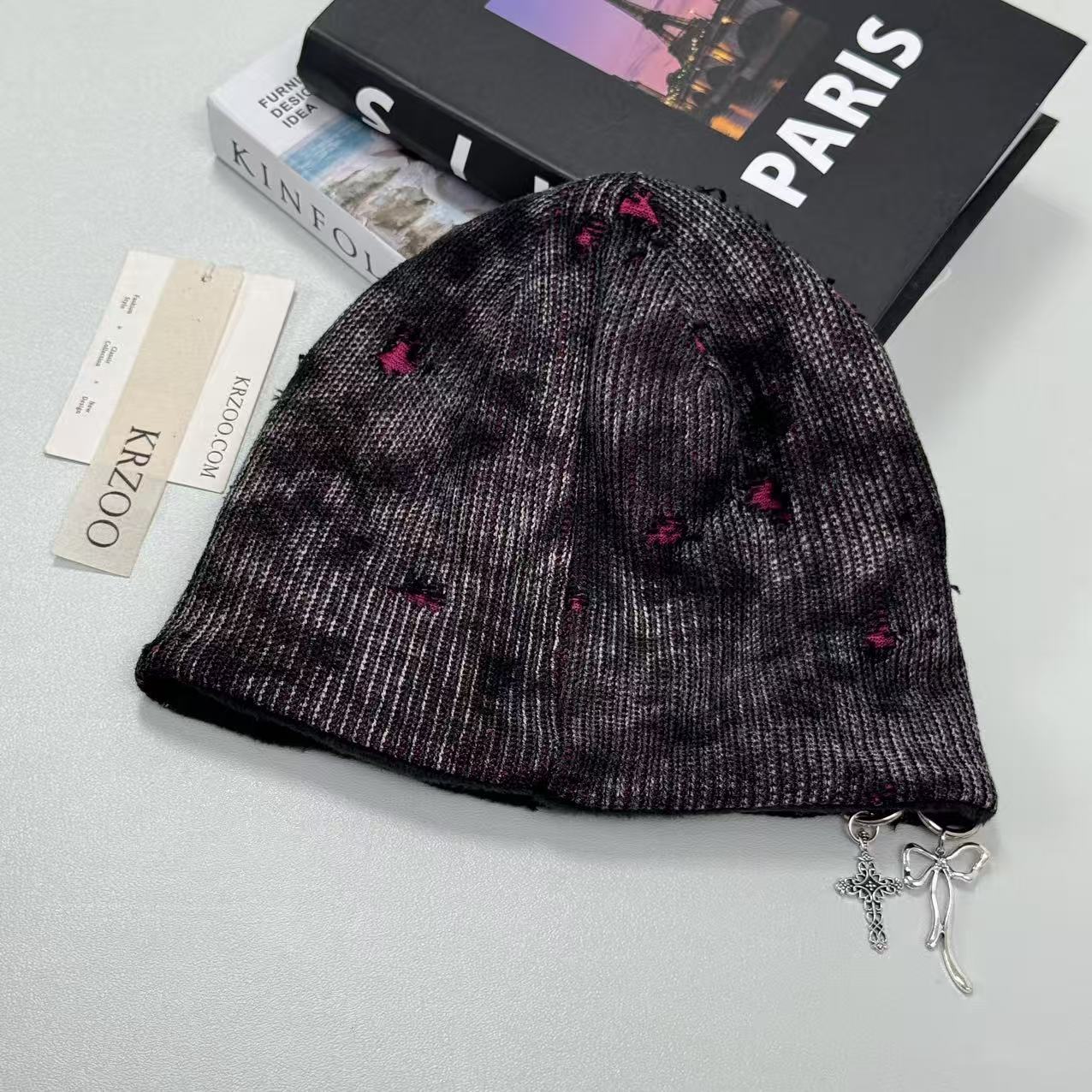 Cross-shaped hole distressed knitted hat