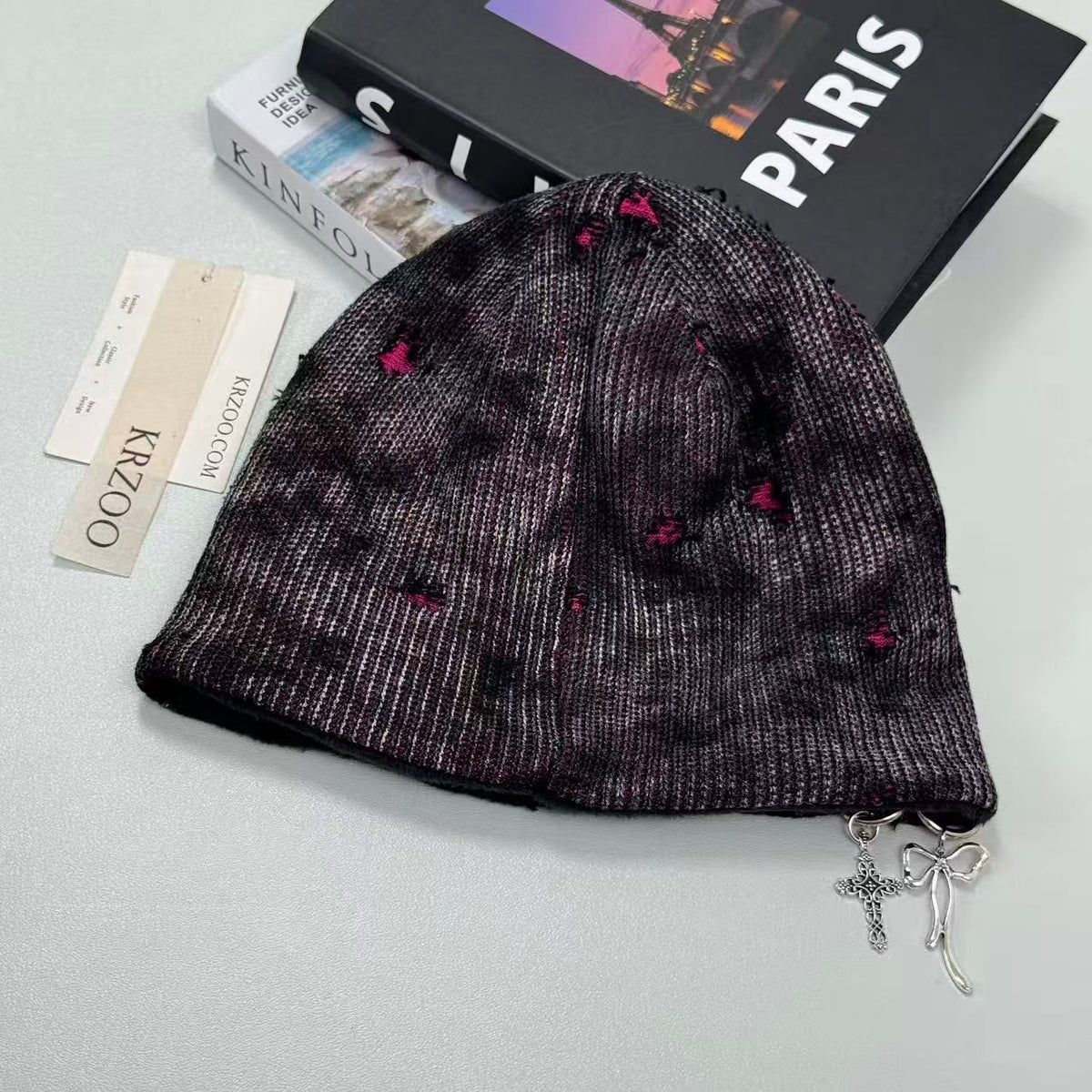 Cross-shaped hole distressed knitted hat
