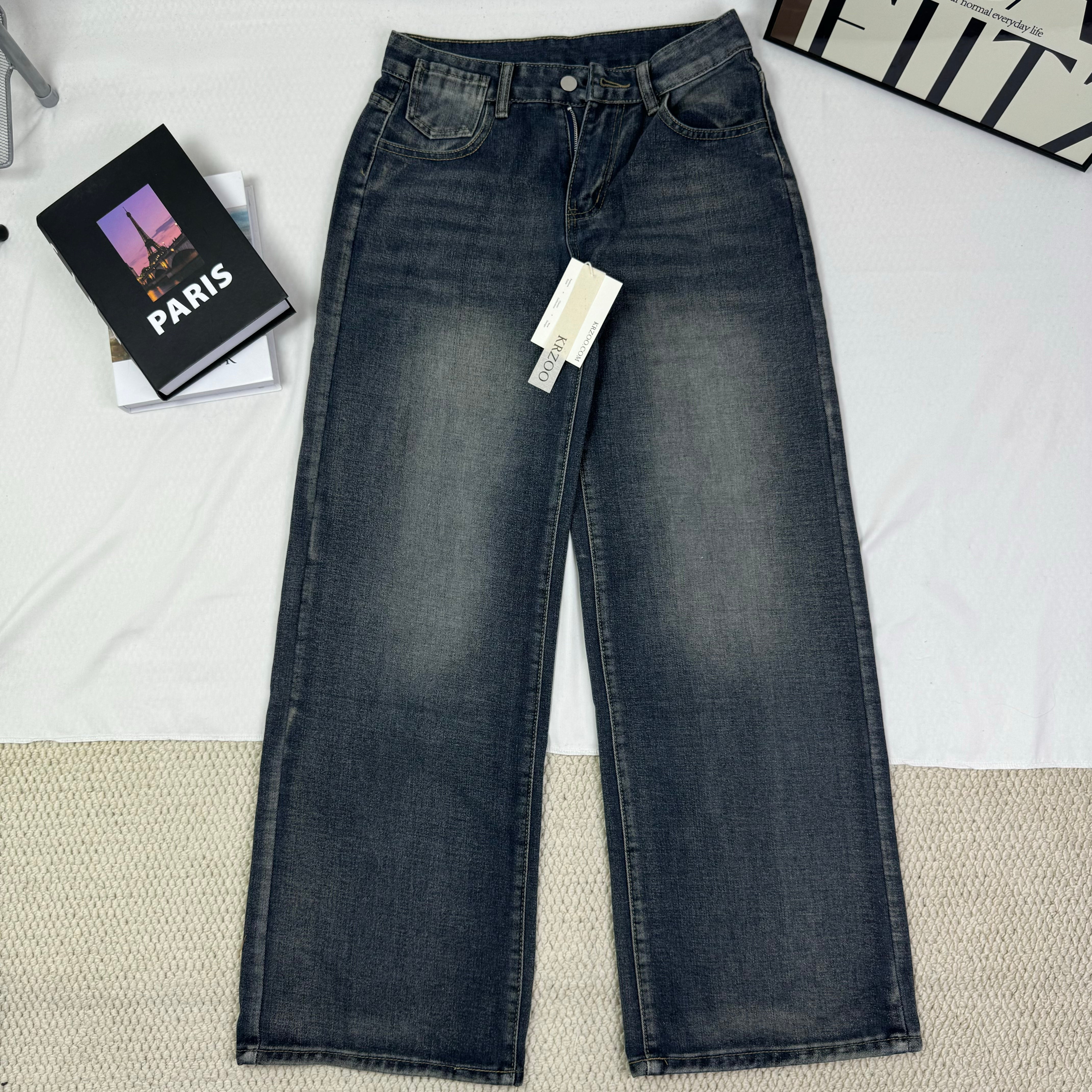 Washed and distressed denim pants