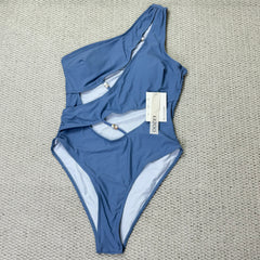 Solid-color irregularly perforated bikini