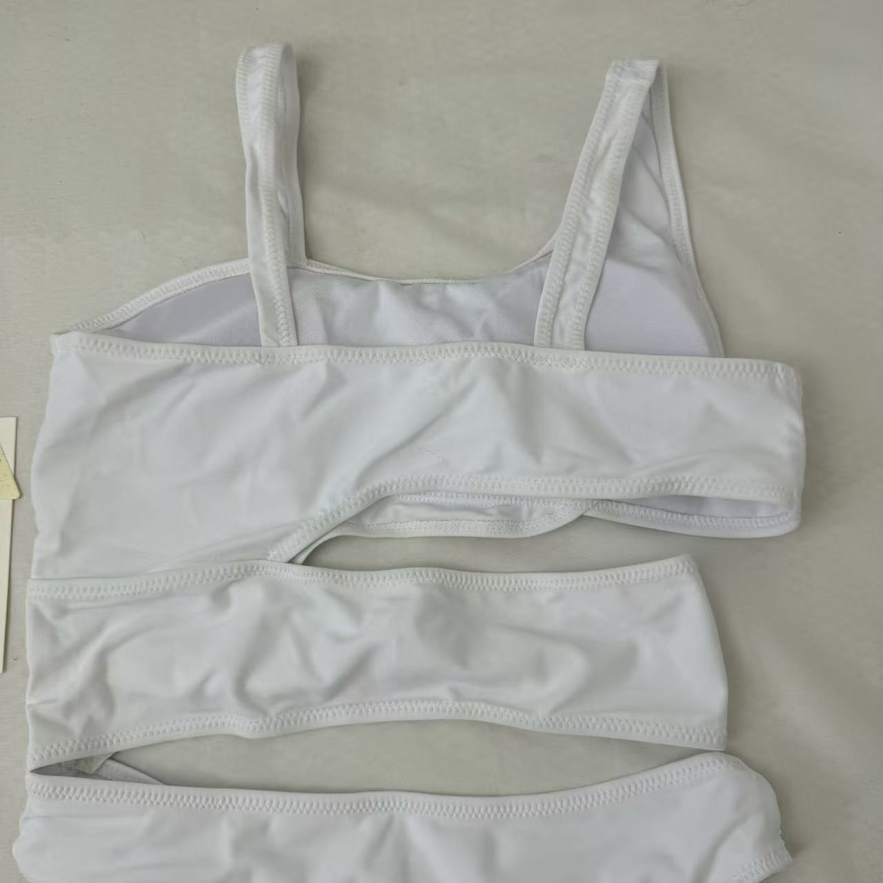 Patchwork hollowed-out one-piece top