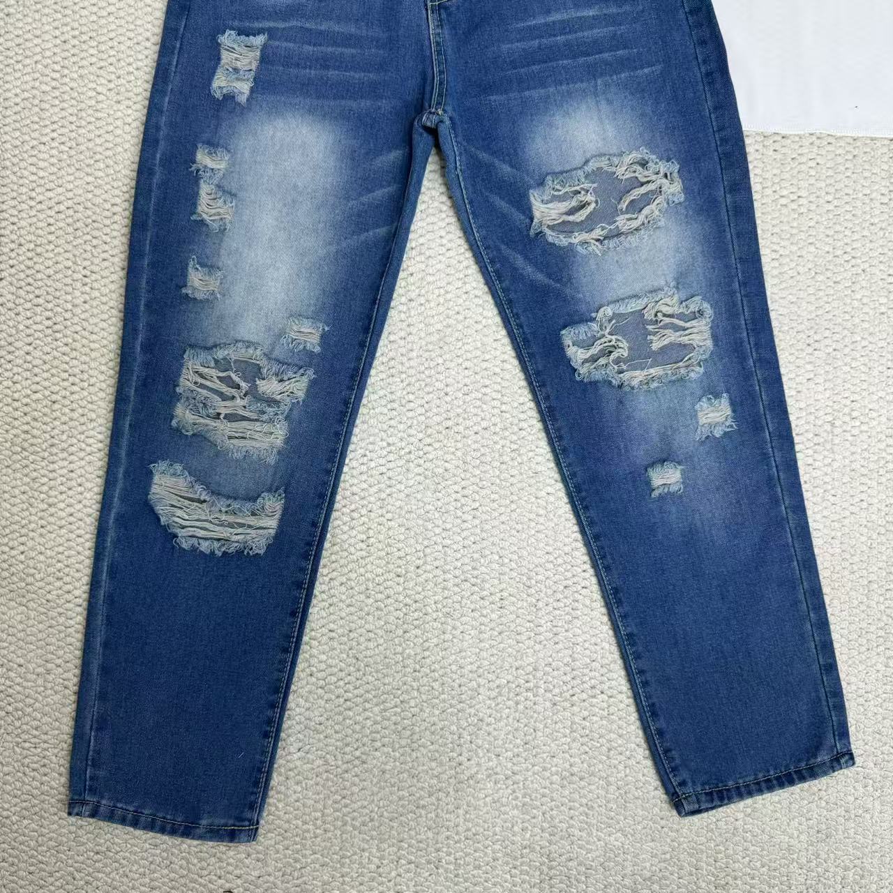 High-Waisted Ripped Jeans