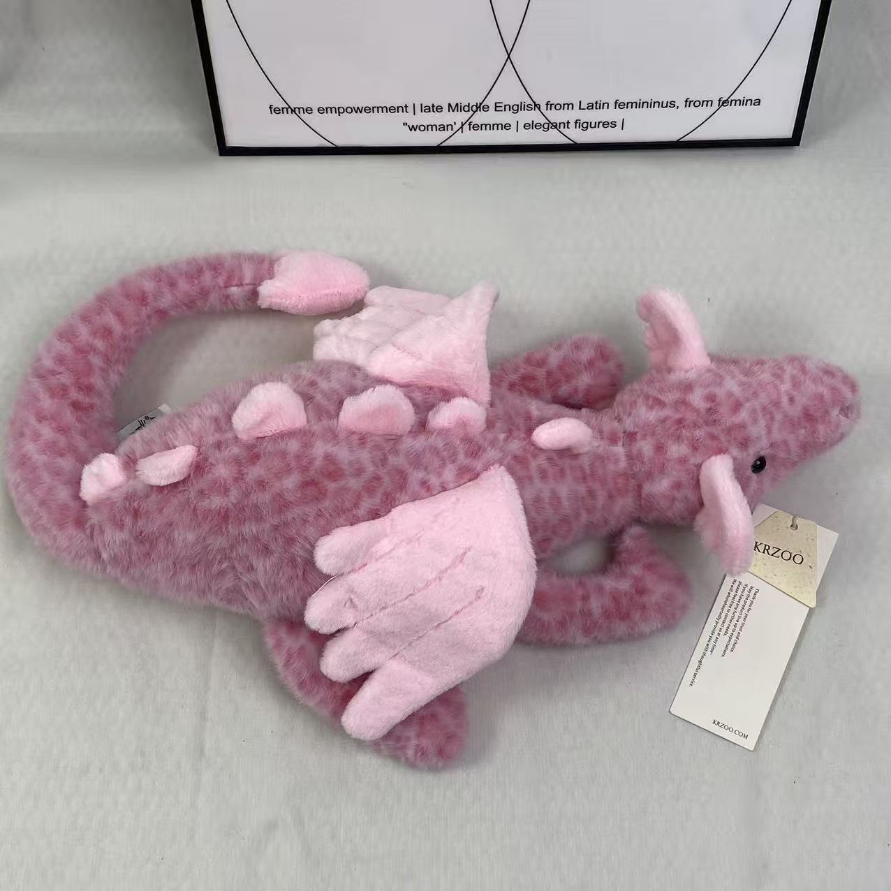 Pink little dragon doll