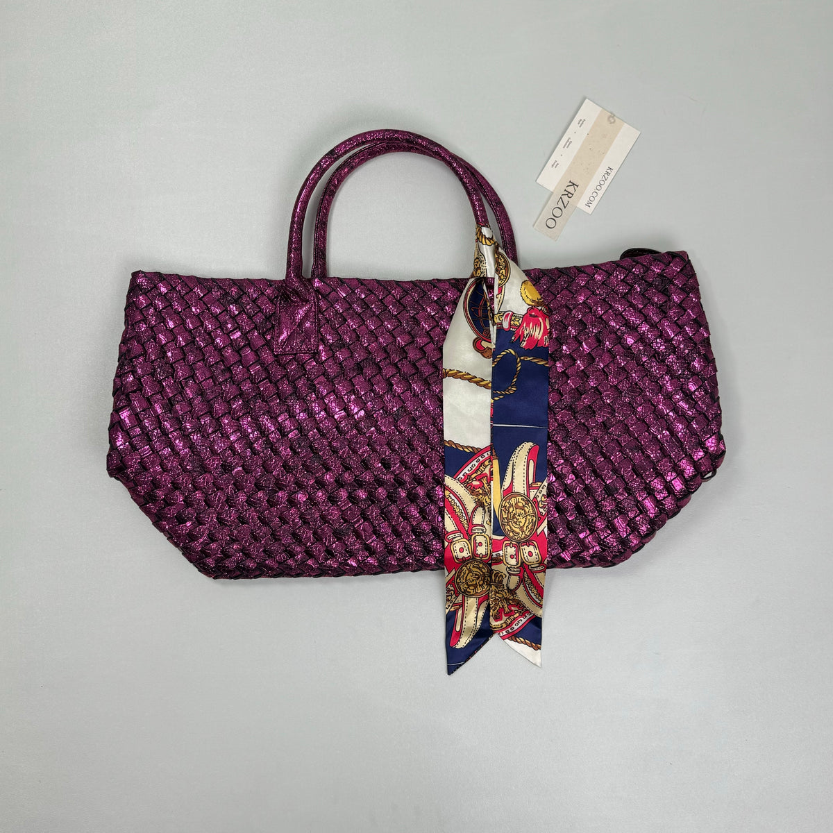Snake-pattern woven shoulder bag