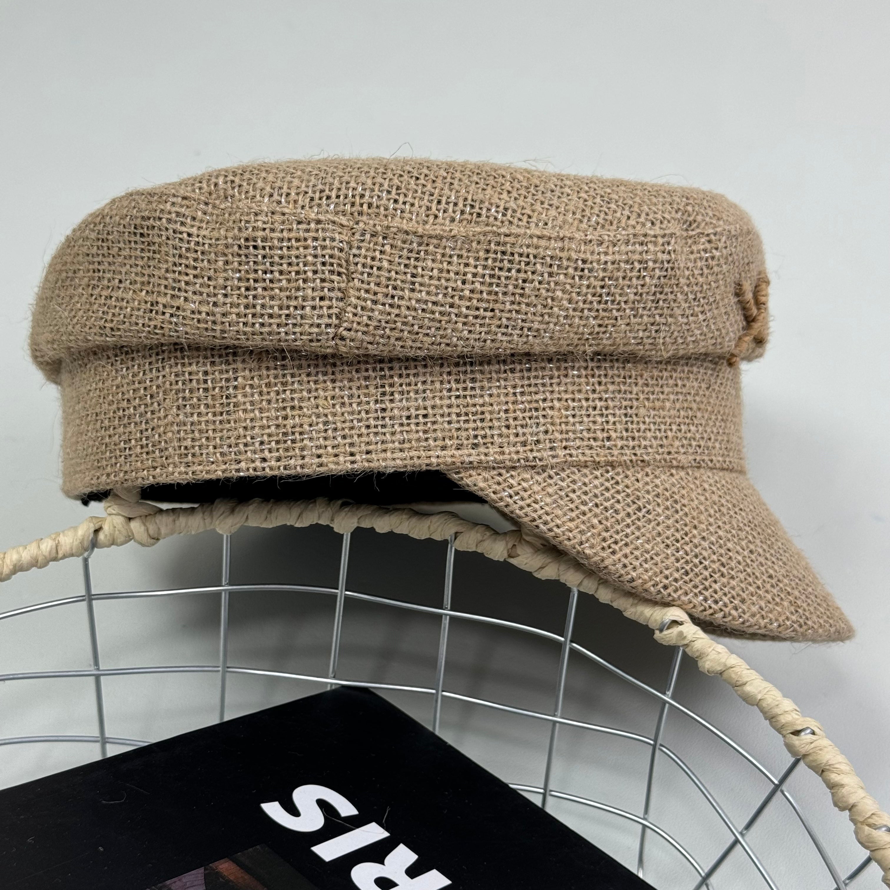 Woven straw cap with a flat top