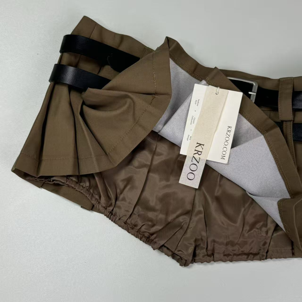 Double belt half-length pleated A-line mini skirt