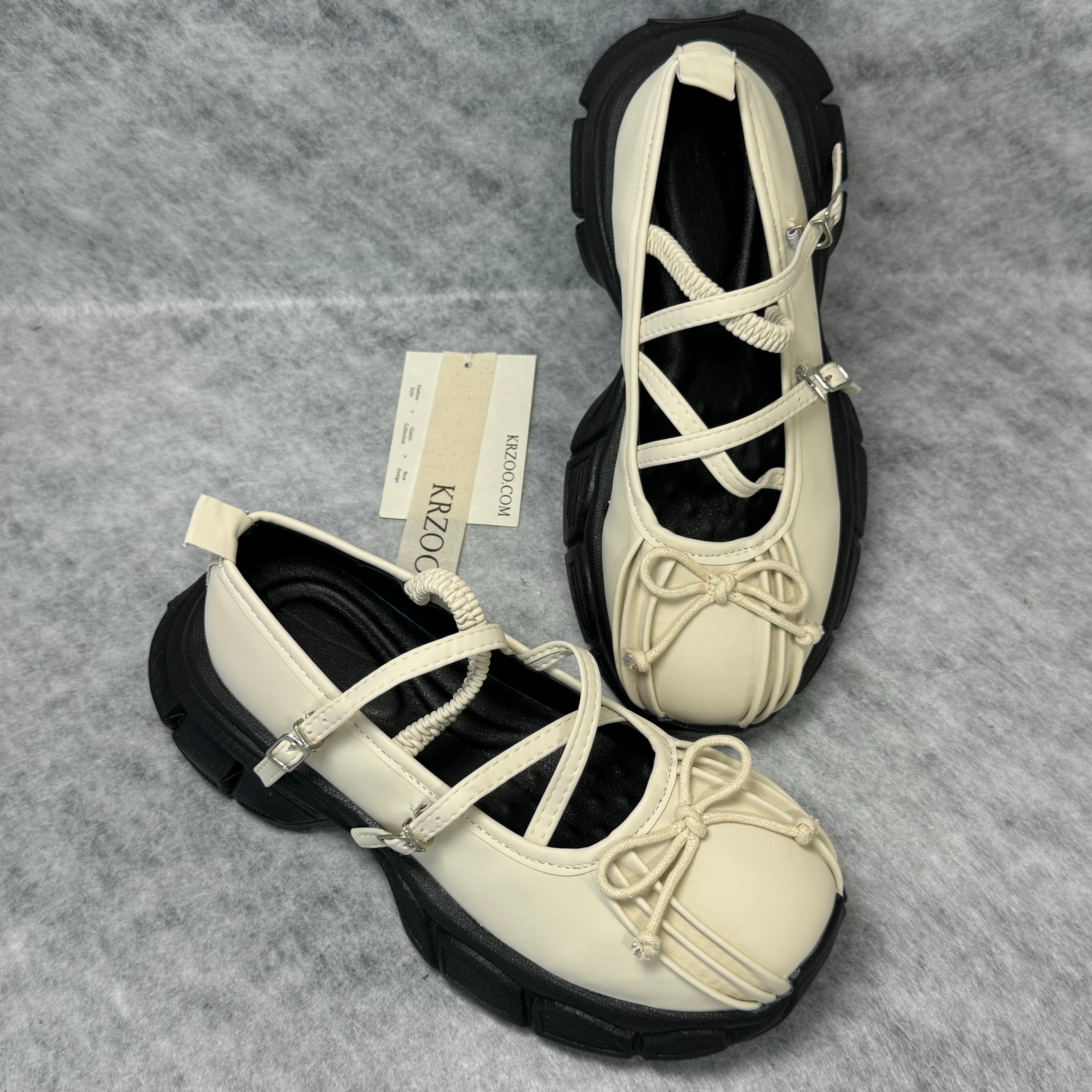 Belted platform ballet shoes with bow ties