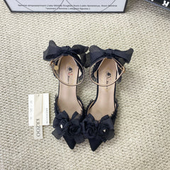 Black wedding high heels with pointed toes