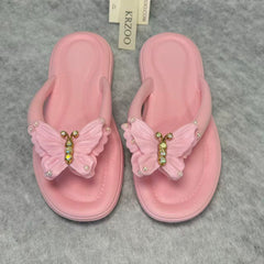 Diamond-shaped bow flip-flops