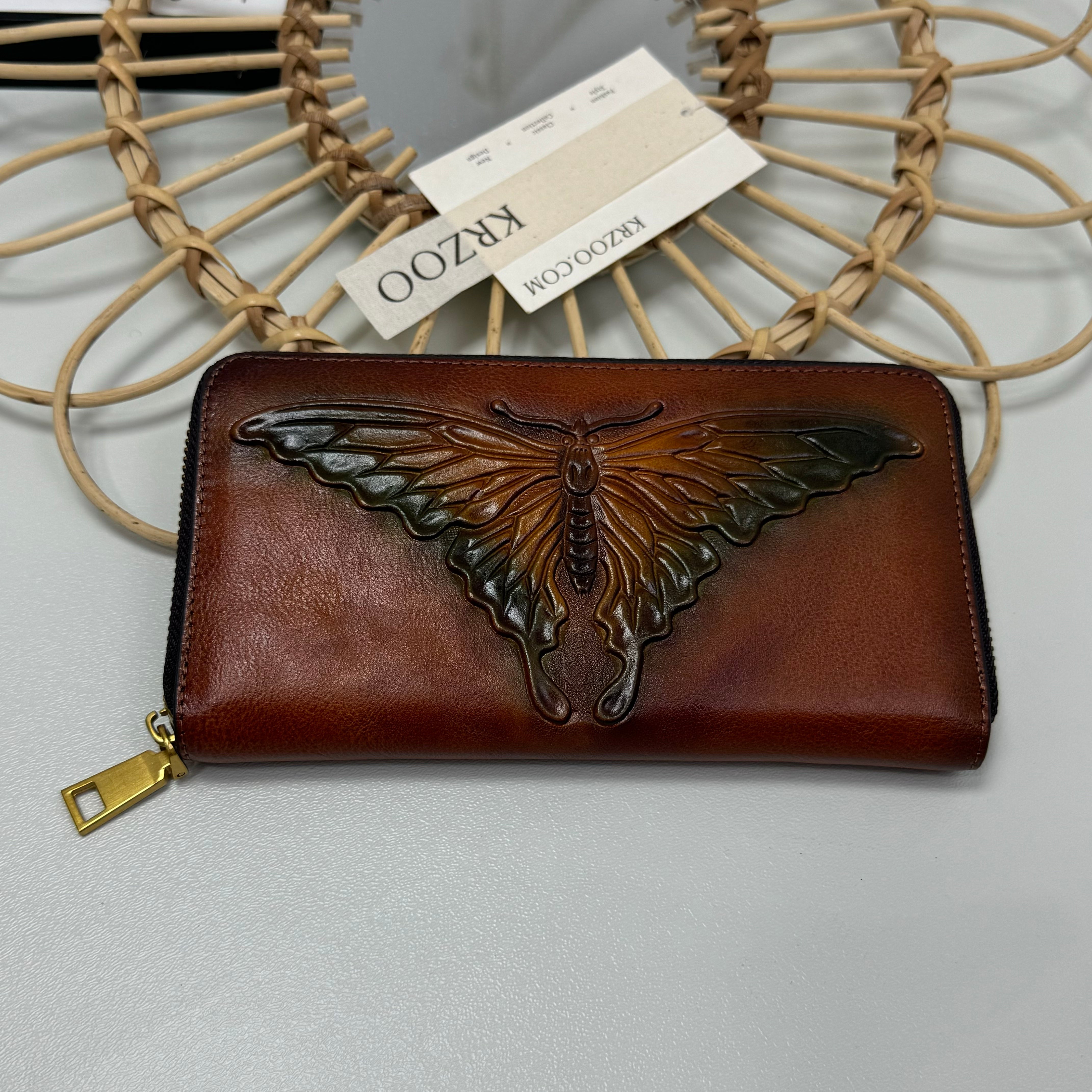 Butterfly embossed leather wallet