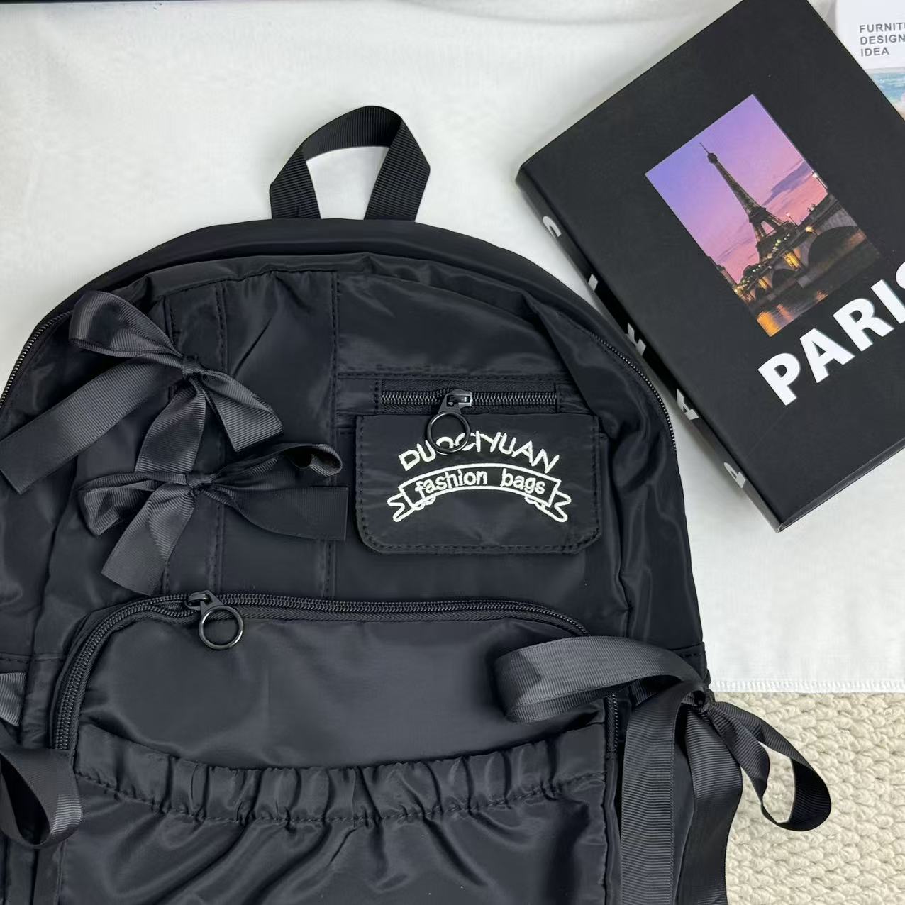 Compact pleated backpack