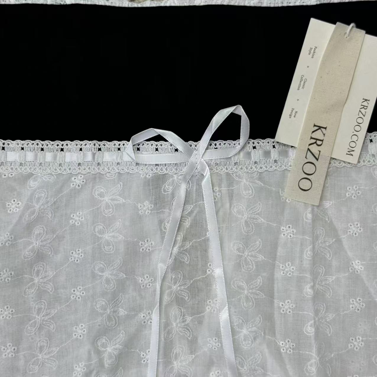 Wrap-around bodice with one shoulder opening