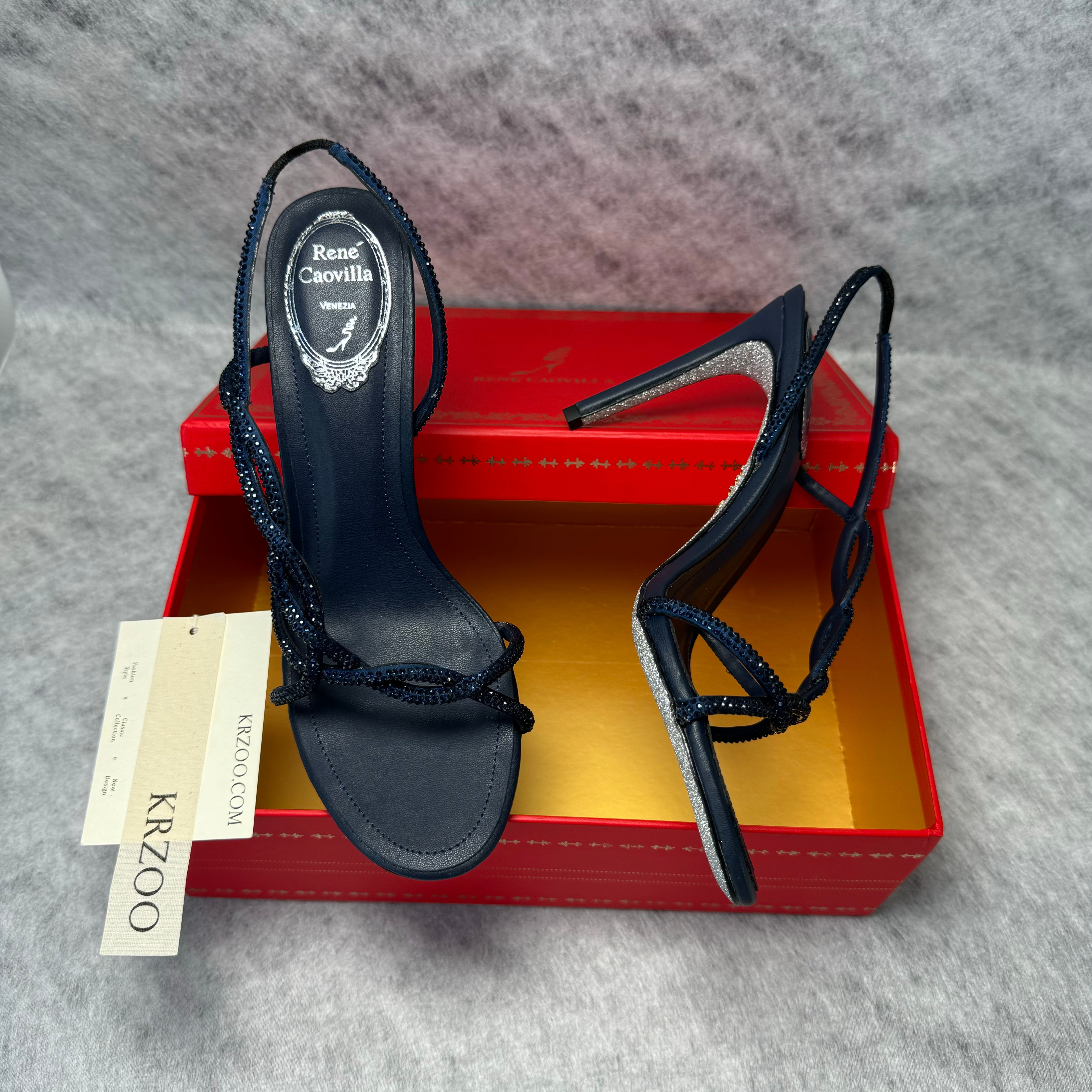 Spiked strappy high heels with open toes