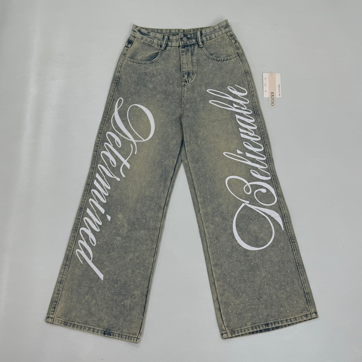 Washed letter-printed sequined denim pants
