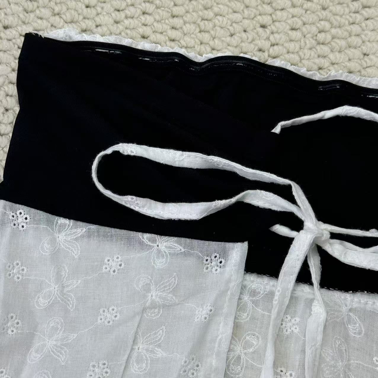 Wrap-around bodice with one shoulder opening
