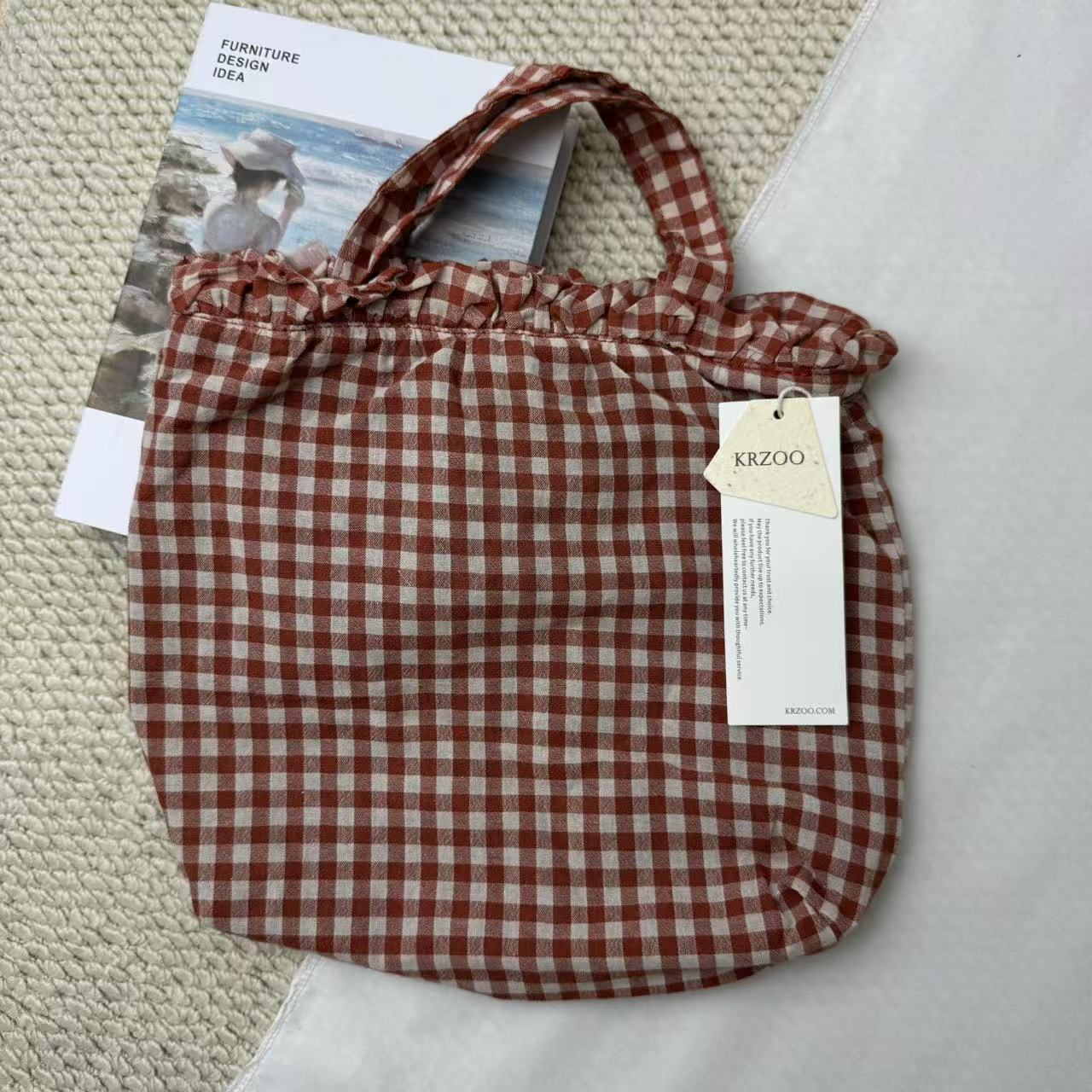 Small Red Handbag With A Checkered Pattern
