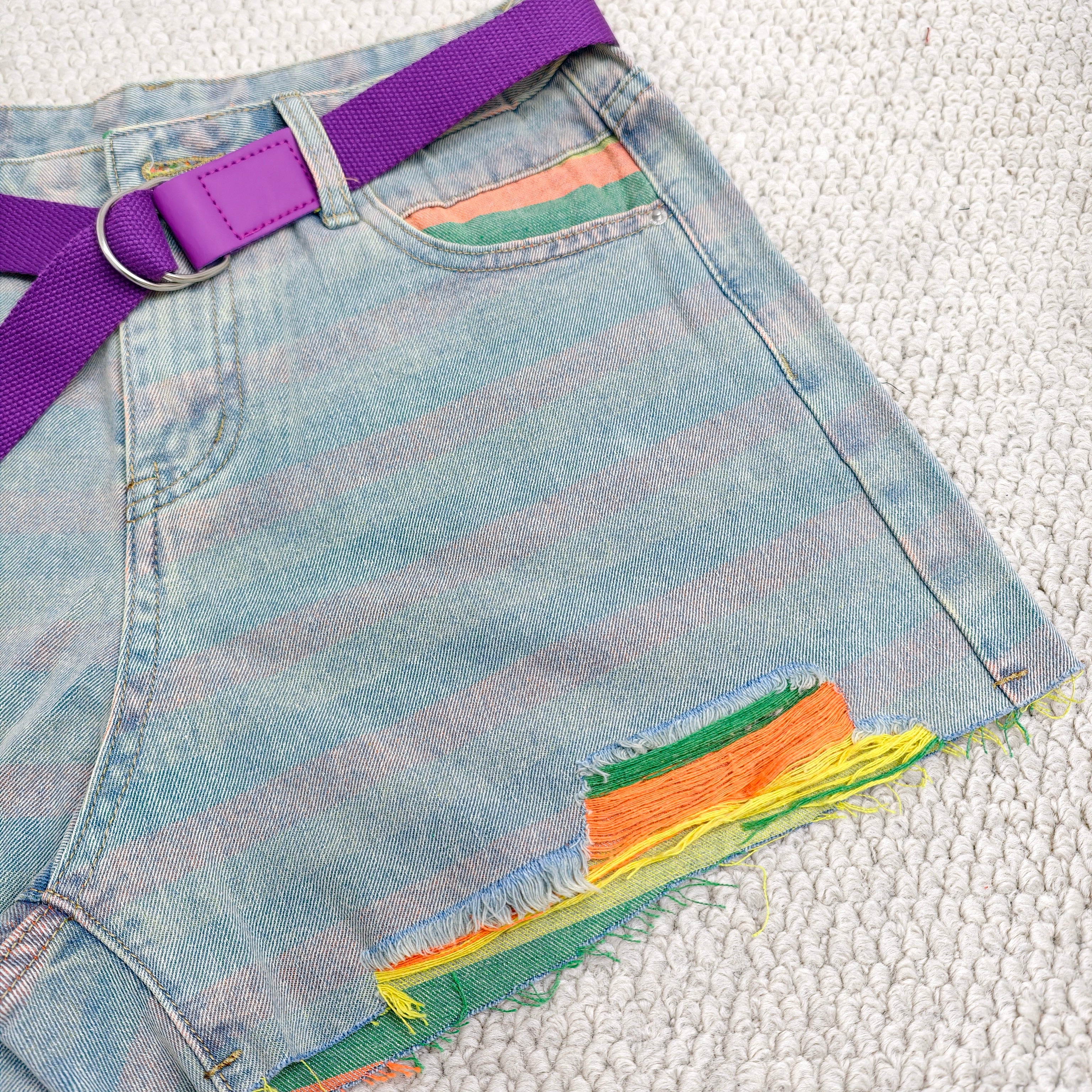 Striped holey denim shorts