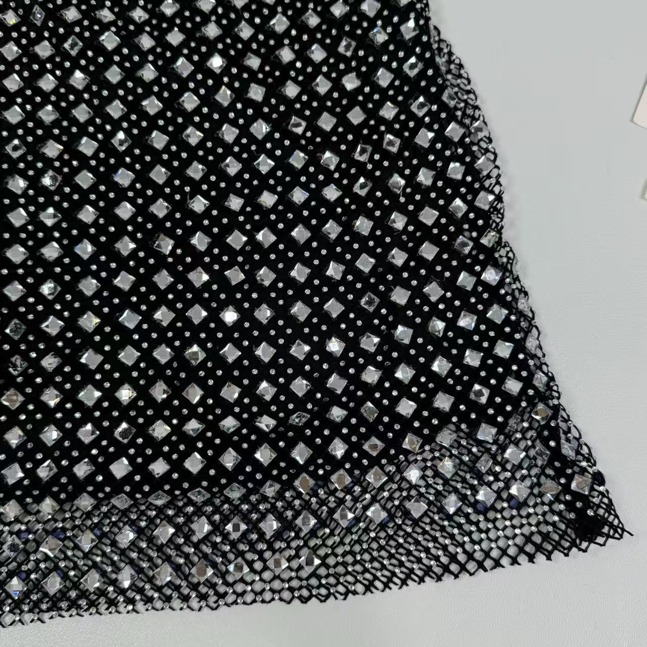 Beaded and rhinestone-studded half-length skirt