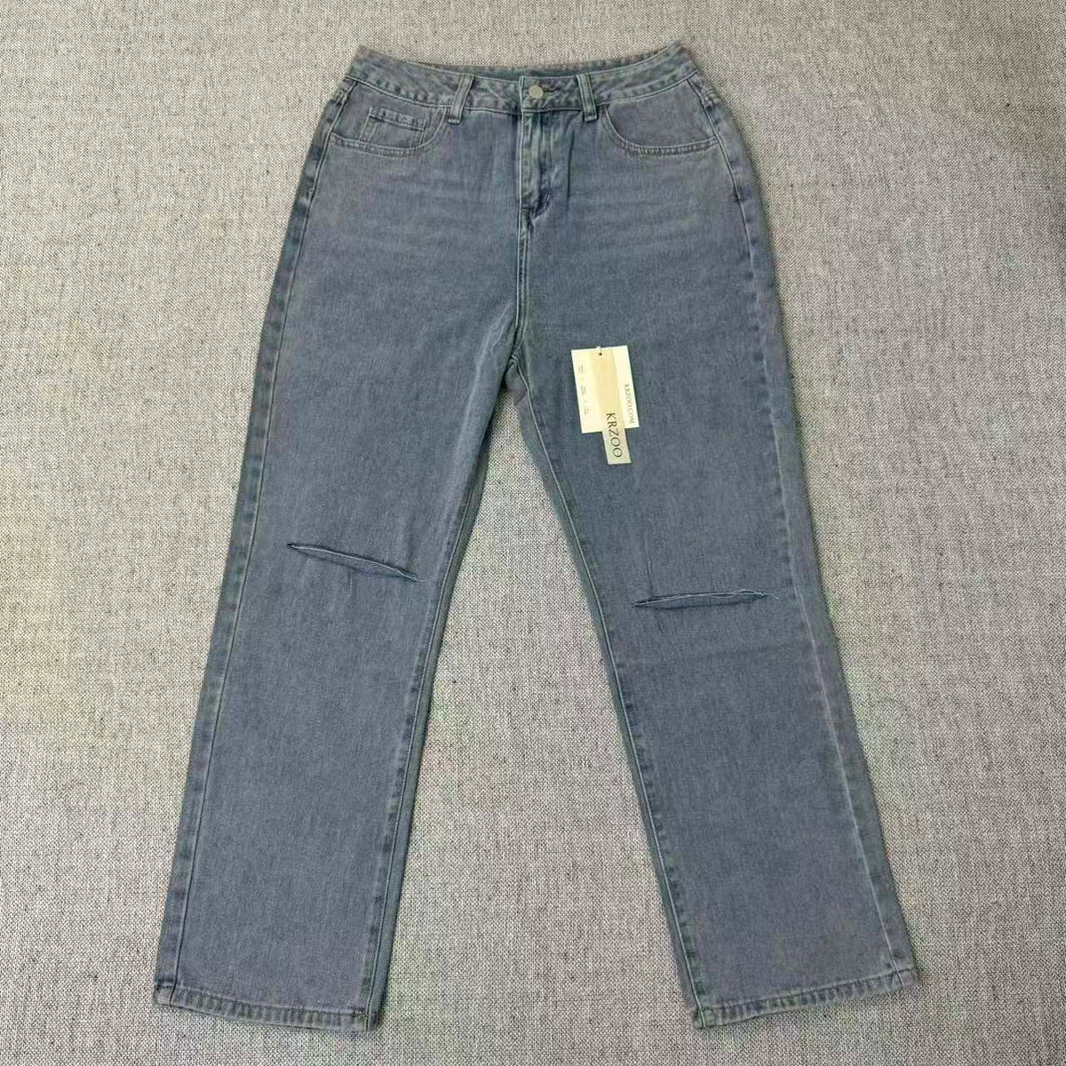 High-waist fringed fabric cutting through the jeans