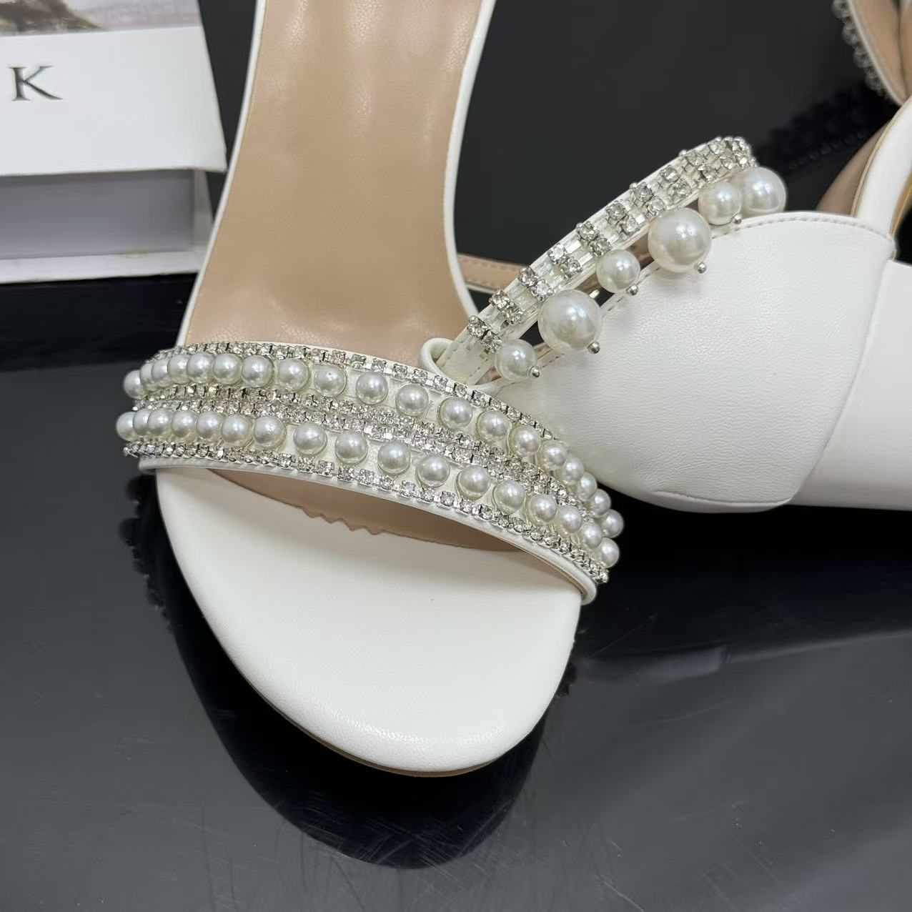 White ankle strap pearl necklace sandals